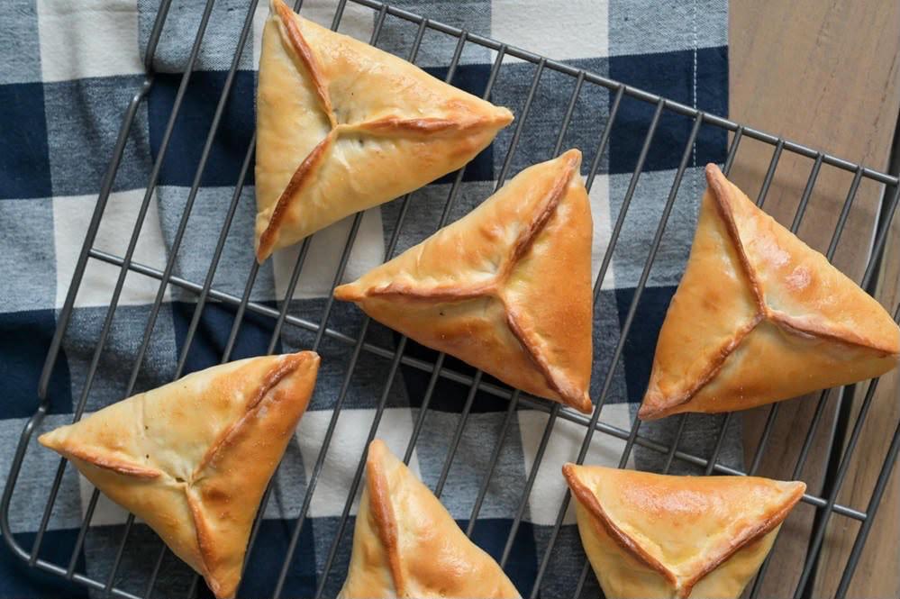 Finished triangular Fatayer pastries